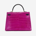 Backside of a pre-loved Hermès Kelly 35 HSS Crocodile Porosus Rose Scheherazade / Aubergine on SACLÀB