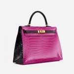Side perspective of a pre-loved Hermès Kelly 35 HSS Crocodile Porosus Rose Scheherazade / Aubergine on SACLÀB