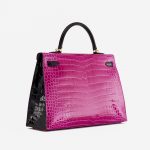Backside of a pre-loved Hermès Kelly 35 HSS Crocodile Porosus Rose Scheherazade / Aubergine on SACLÀB