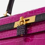 Hardware detail of a pre-loved Hermès Kelly 35 HSS Crocodile Porosus Rose Scheherazade / Aubergine on SACLÀB