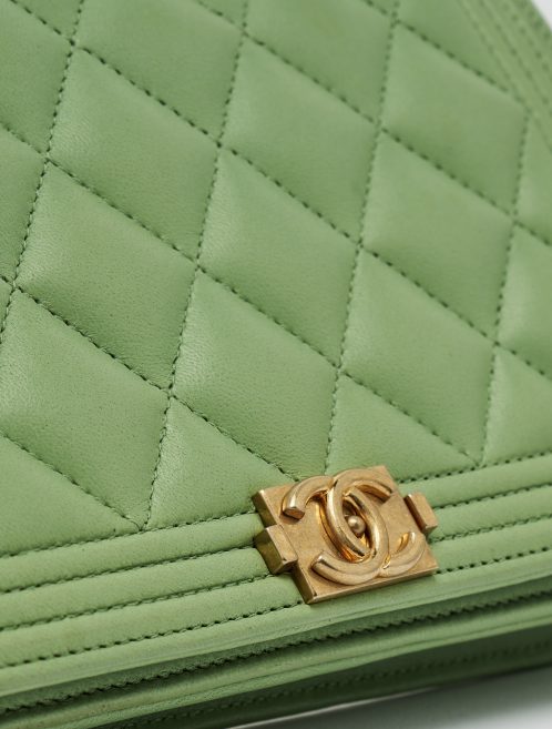 Gold Chanel Hardware Detail of a pre-loved Chanel Boy Wallet on Chain Lambskin in Light Green on SACLÀB