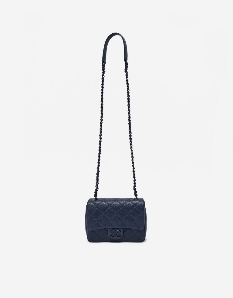 Shoulder strap of a pre-loved Chanel Timeless Mini Caviar Blue Incognito on SACLÀB