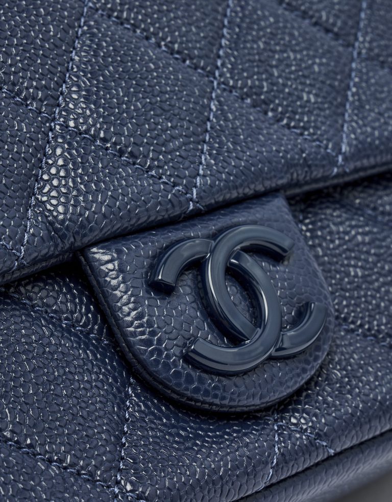 Hardware detail of a pre-loved Chanel Timeless Mini Caviar Blue Incognito on SACLÀB