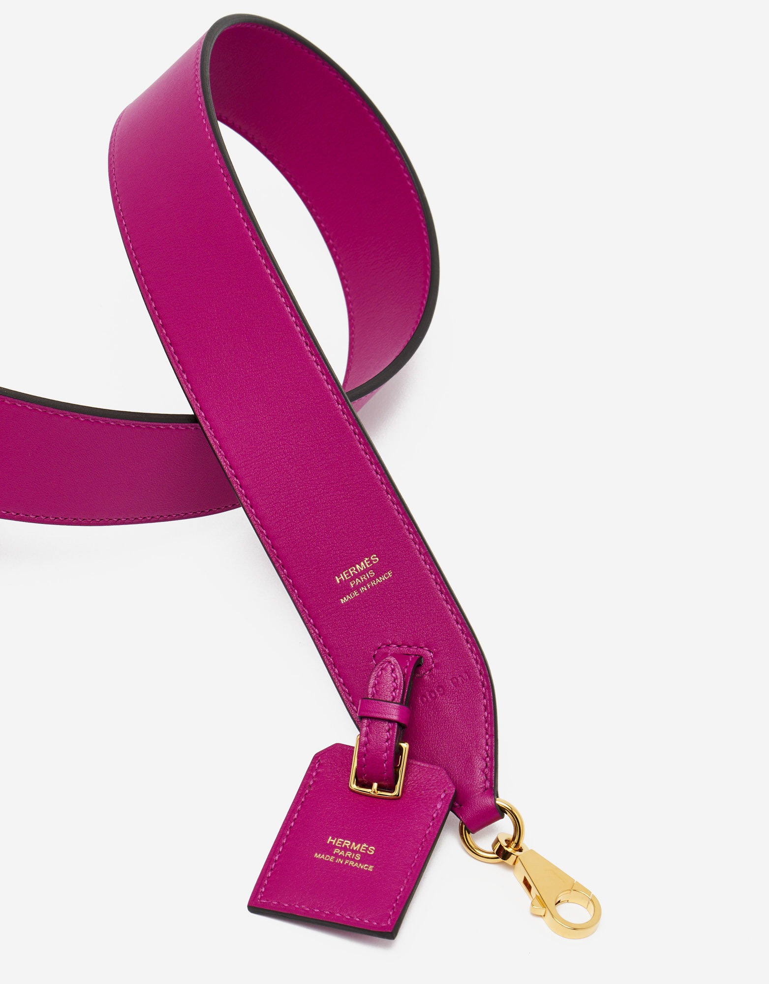A ROSE POURPRE SWIFT LEATHER CLOCHETTE SHOULDER STRAP WITH GOLD HARDWARE,  HERMÈS, 2017