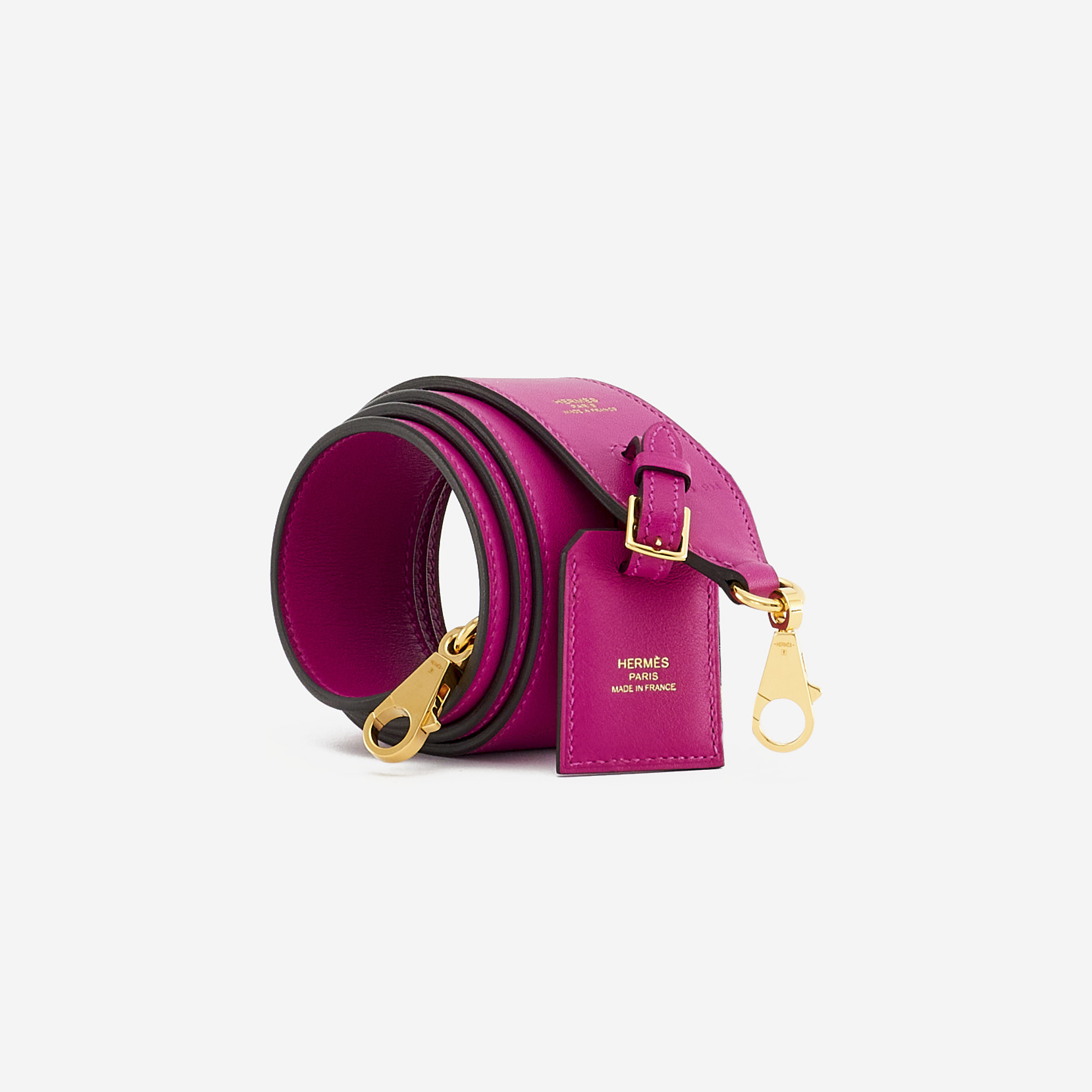 A ROSE POURPRE SWIFT LEATHER CLOCHETTE SHOULDER STRAP WITH GOLD HARDWARE,  HERMÈS, 2017