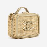 A pre-loved small Chanel Vanity Case in Beige Straw and Gold Leather on SACLÀB