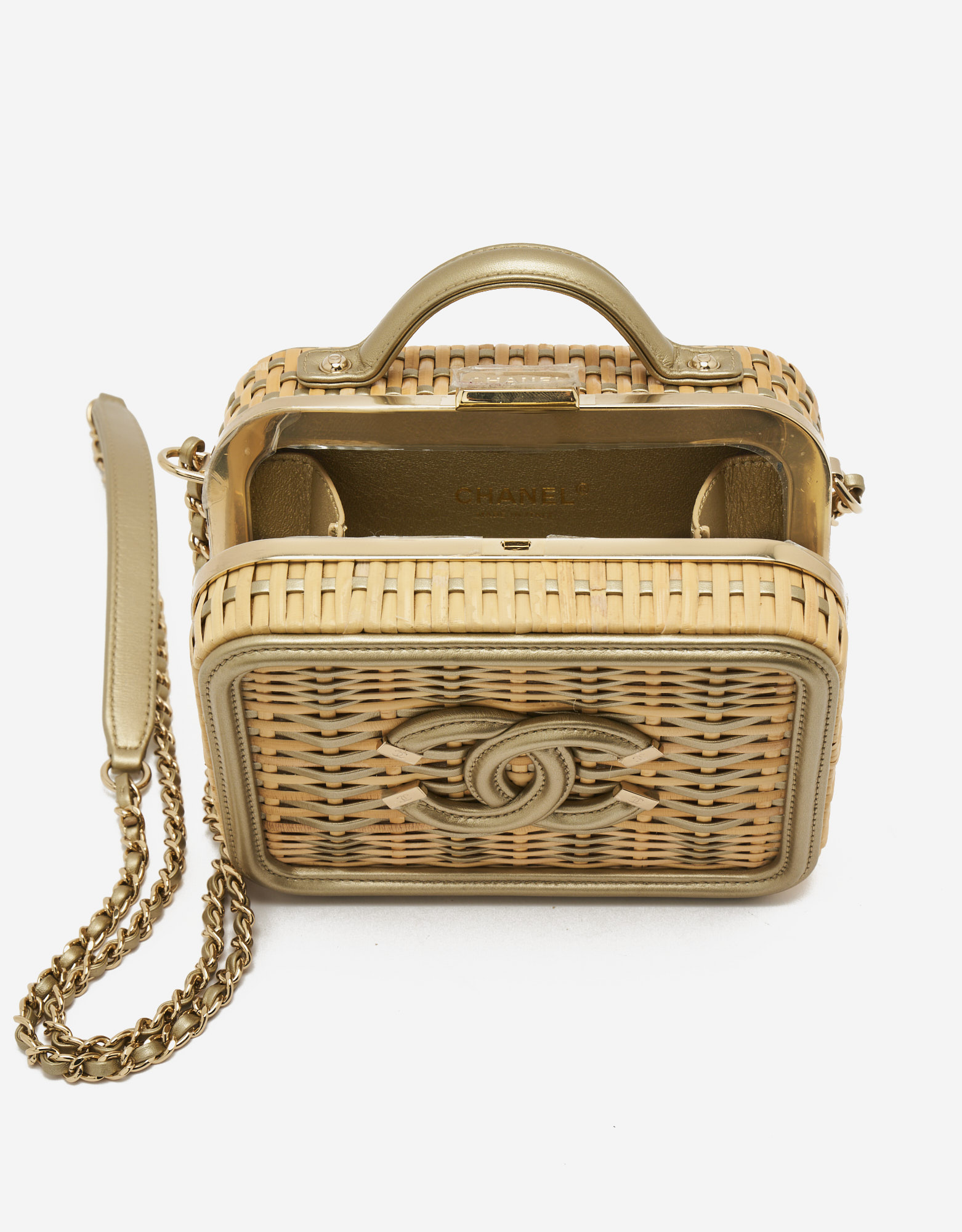 Petit vanity case Chanel en paille beige et cuir doré, en état d'occasion, sur SACLÀB