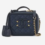 A pre-loved Chanel Vanity Case Small Caviar Leather in Dark Blue on SACLÀB