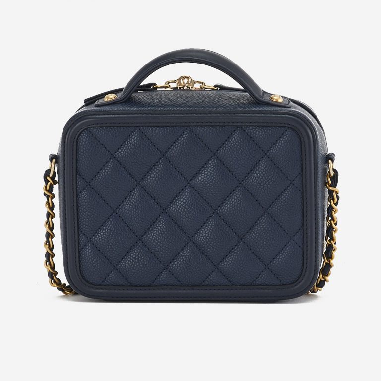 A pre-loved Chanel Vanity Case Small Caviar Leather in Dark Blue on SACLÀB