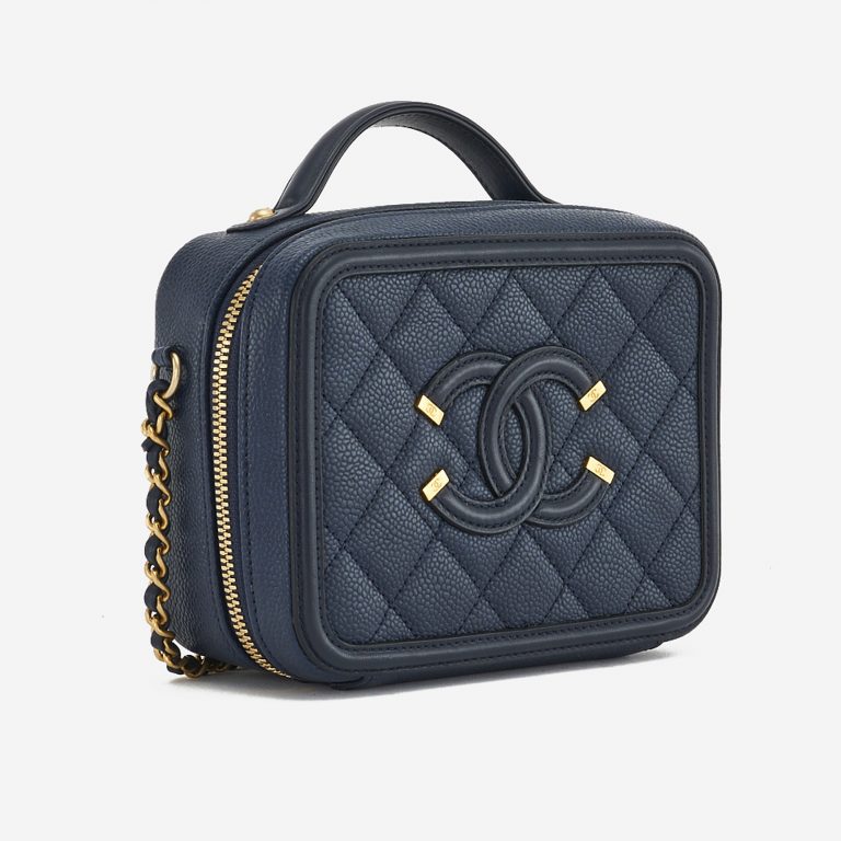 A pre-loved Chanel Vanity Case Small Caviar Leather in Dark Blue on SACLÀB