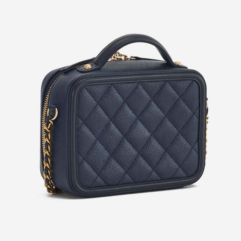 A pre-loved Chanel Vanity Case Small Caviar Leather in Dark Blue on SACLÀB