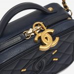 CC Charm Detail on a pre-loved Chanel Vanity Case Small Caviar Leather in Dark Blue on SACLÀB