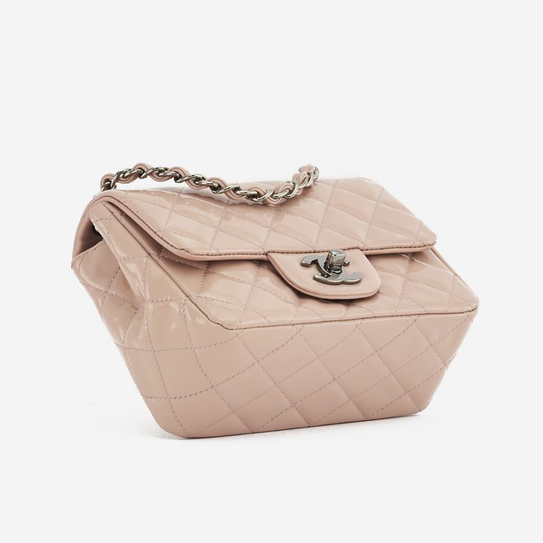 A pre-loved Chanel Timeless Mini Square in Nude Patent Leather on SACLÀB