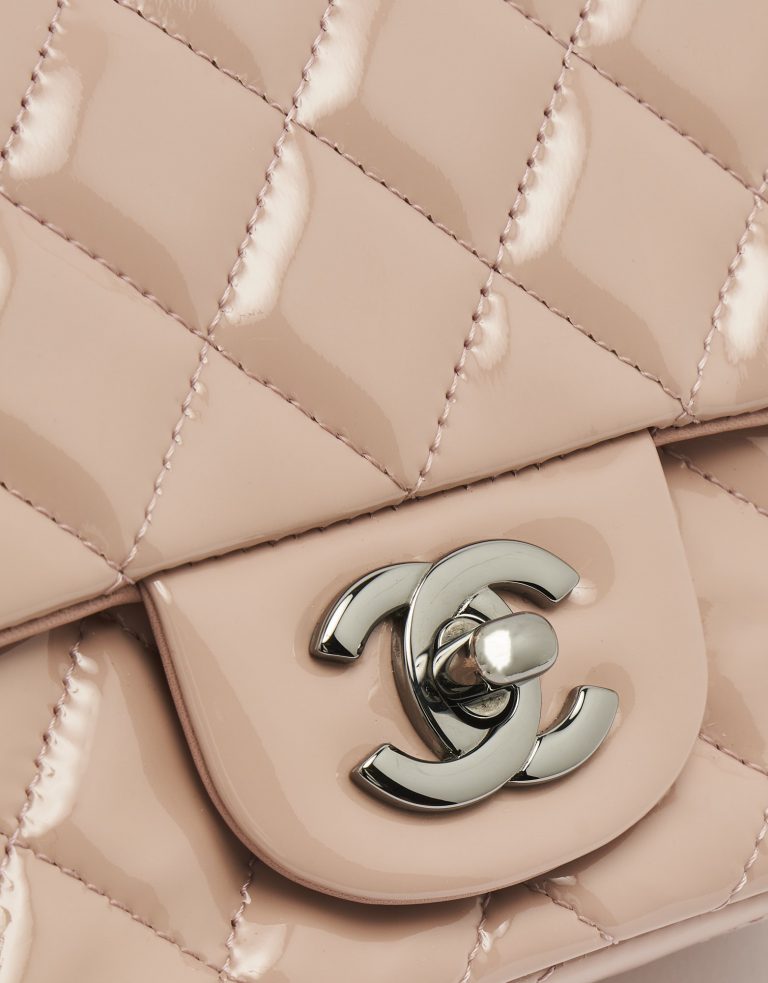 A pre-loved Chanel Timeless Mini Square in Nude Patent Leather on SACLÀB