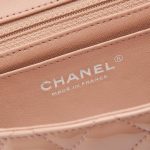 A pre-loved Chanel Timeless Mini Square in Nude Patent Leather on SACLÀB