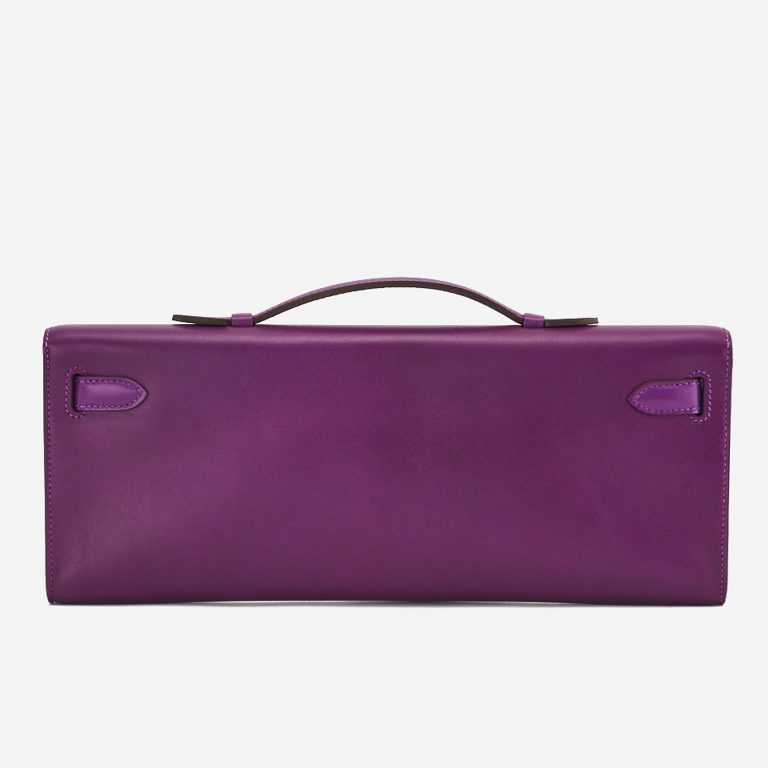 A pre-loved Hermès Kelly Cut Clutch in Anemone Swift Leather on SACLÀB