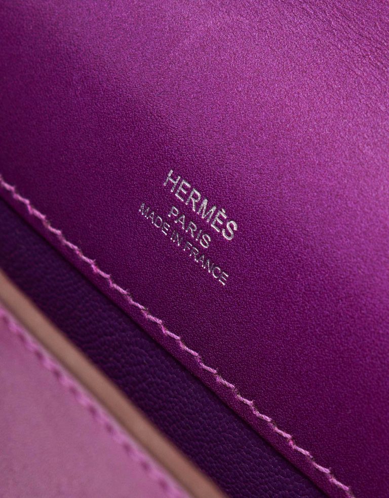 A pre-loved Hermès Kelly Cut Clutch in Anemone Swift Leather on SACLÀB