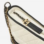 Hardware Details on a black and white Chanel Gabrielle Bag Large on SACLÀB