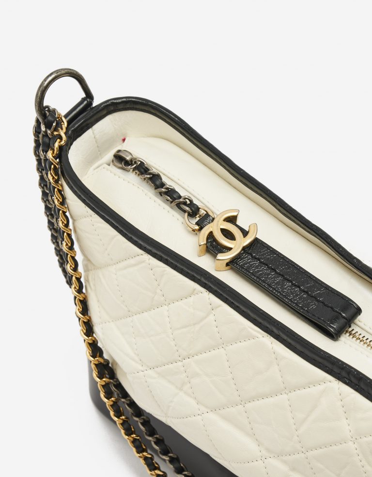 Hardware Details on a black and white Chanel Gabrielle Bag Large on SACLÀB