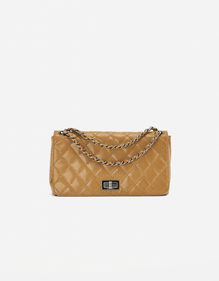 A pre-loved Chanel 2.55 Medium in Beige Caviar Patent Leather on SACLÀB