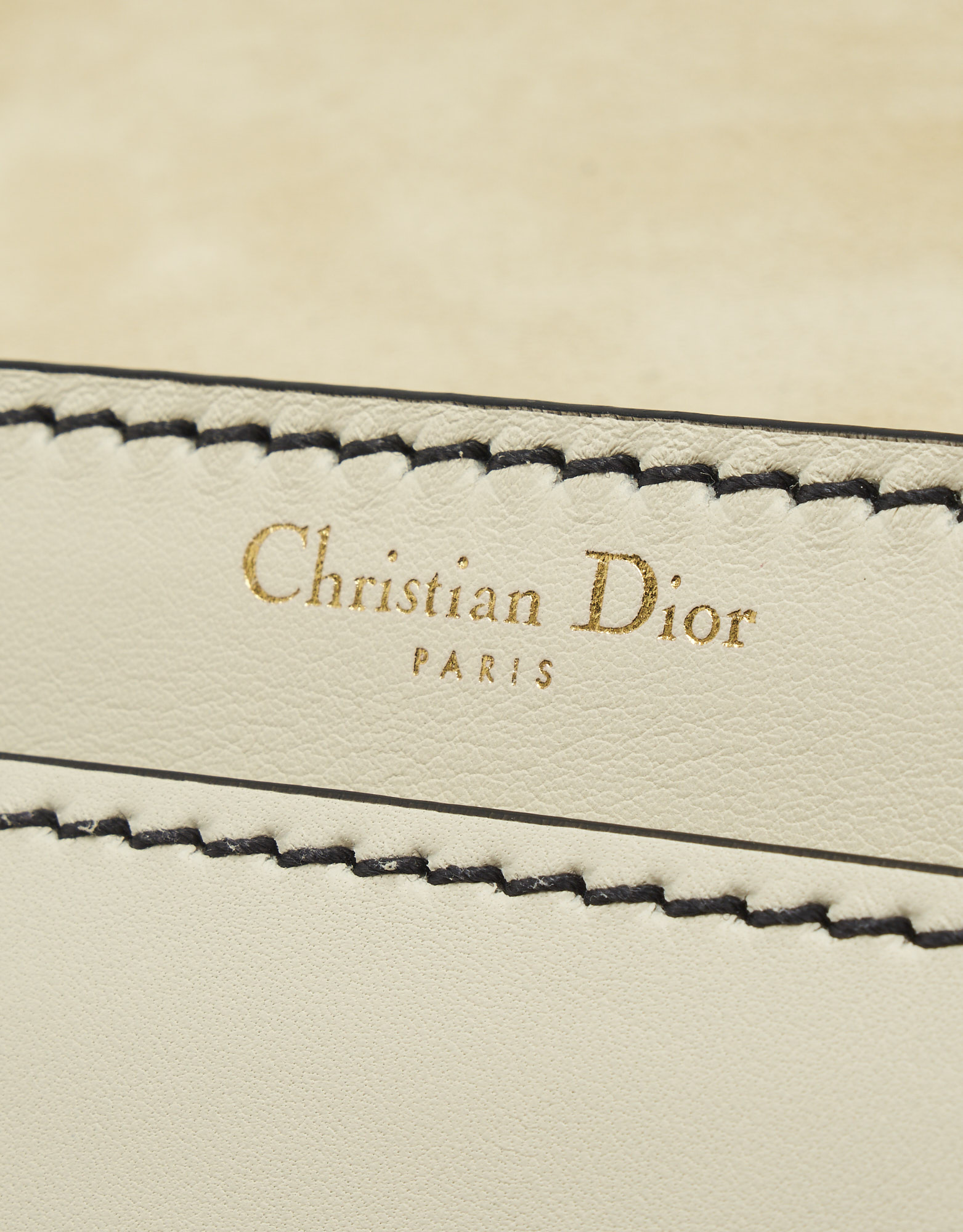 Logo Detail on a pre-loved Dior J'ADIOR Medium Calfskin Beige on SACLÀB