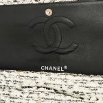 A pre-loved Chanel 2.55 Reissue 226 Tweed White Black Garden Charms on SACLÀB
