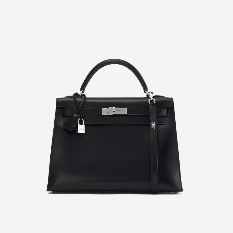 A pre-loved Hermès Kelly 32 Box Leather in Black on SACLÀB