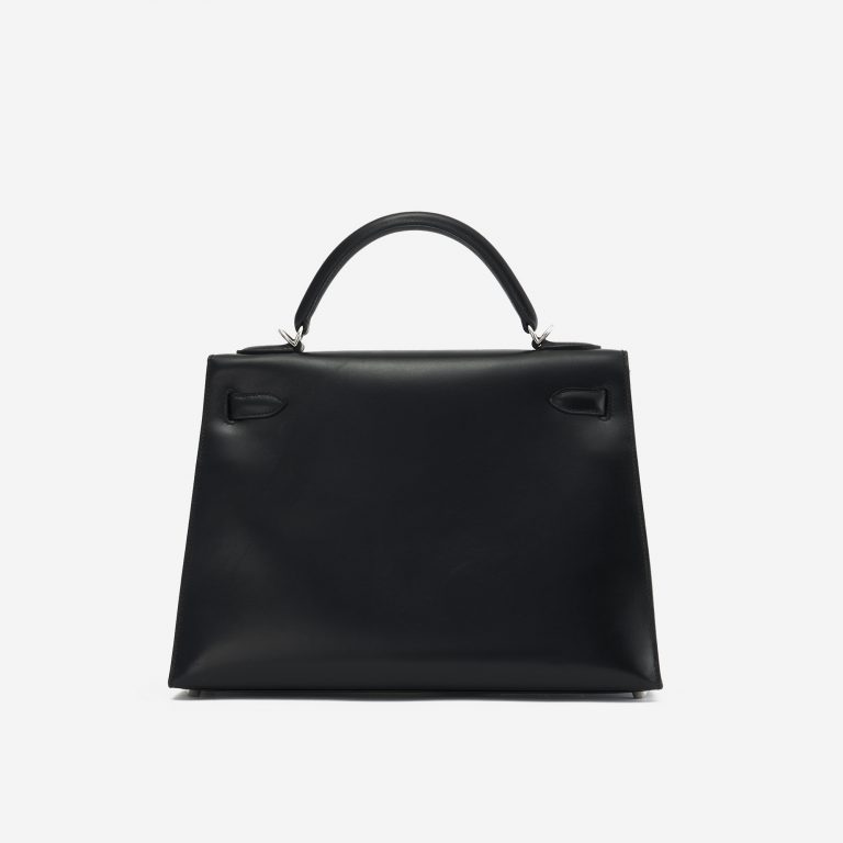 A pre-loved Hermès Kelly 32 Box Leather in Black on SACLÀB