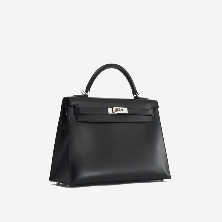 A pre-loved Hermès Kelly 32 Box Leather in Black on SACLÀB