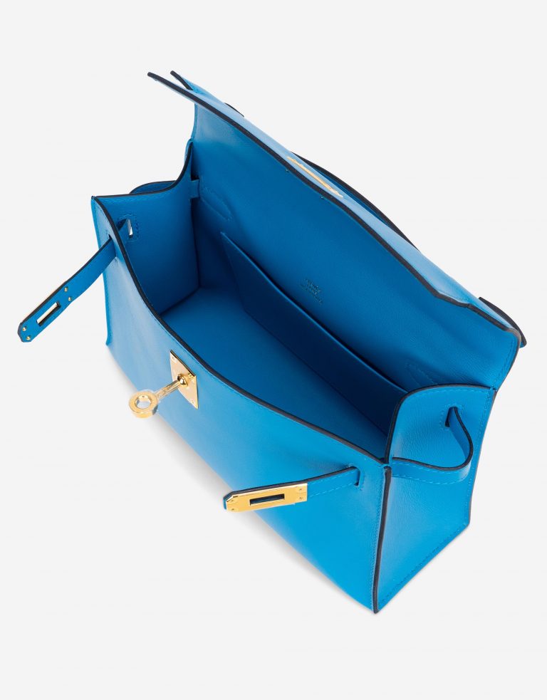 Pre-owned Hermès bag Kelly Pochette Swift Blue Frida Blue | Sell your designer bag on Saclab.com