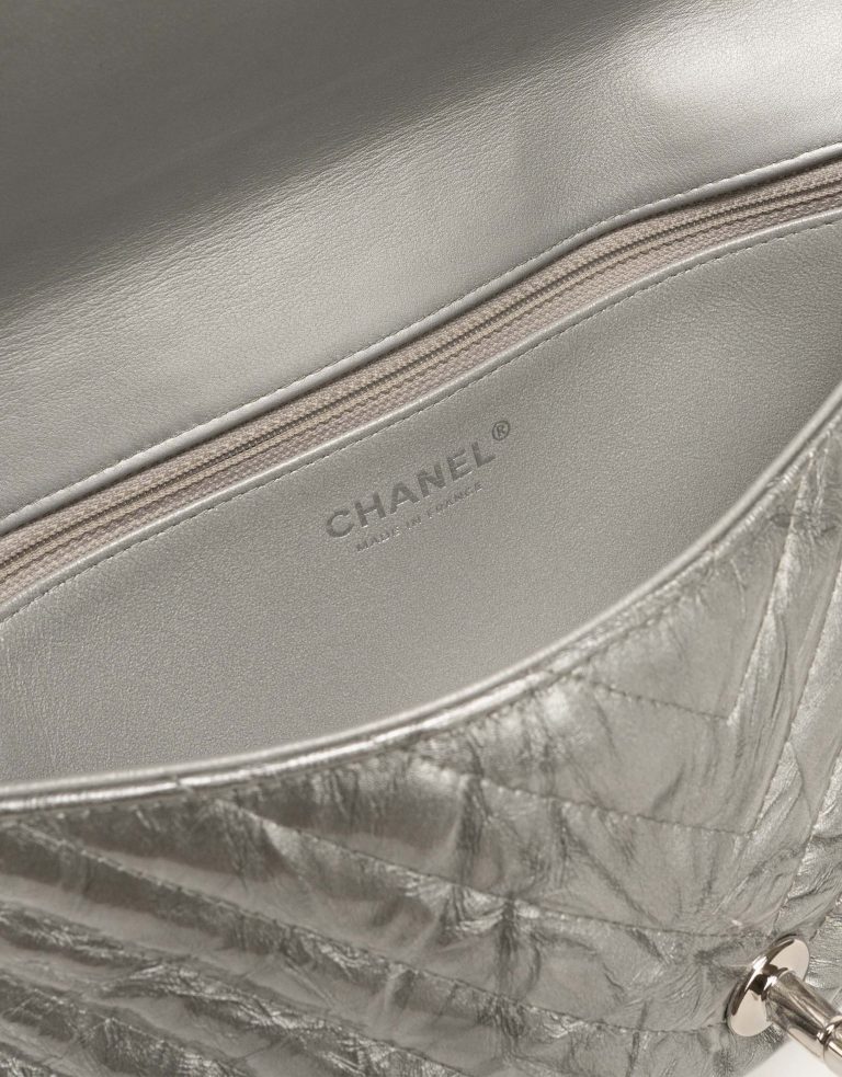 Chanel Timeless Clutch Lammleder Chevron Silber