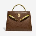 Pre-owned Hermès bag Kelly 32 Ostrich Marron / Vert Anis Brown, Green Front Open | Sell your designer bag on Saclab.com