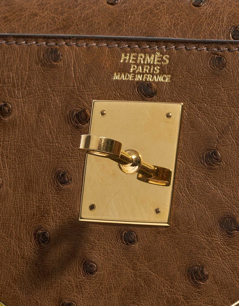 Pre-owned Hermès bag Kelly 32 Ostrich Marron / Vert Anis Brown Front | Sell your designer bag on Saclab.com