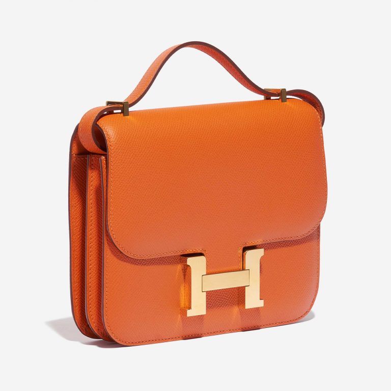 Pre-owned Hermès bag Constance 18 Epsom Feu Orange Side Front | Sell your designer bag on Saclab.com