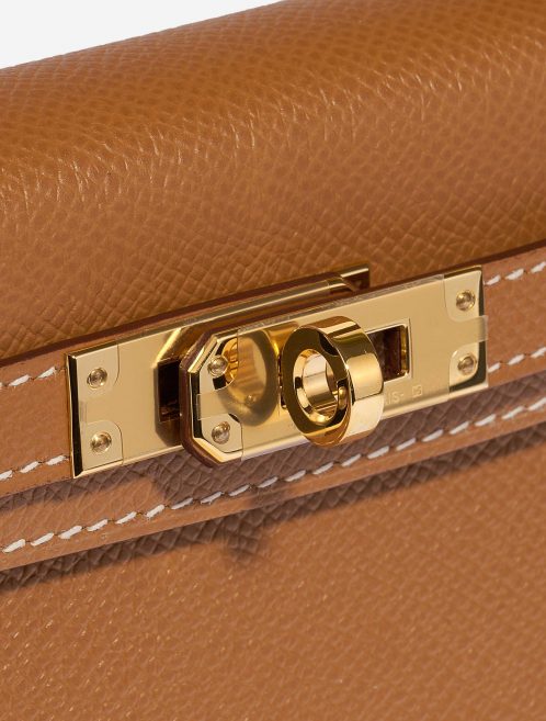 Pre-owned Hermès bag Kelly Mini Epsom Gold Brown Closing System | Sell your designer bag on Saclab.com