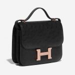 Pre-owned Hermès bag Constance 18 Ostrich Black Black Side Front | Sell your designer bag on Saclab.com