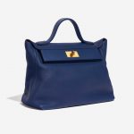 Pre-owned Hermès bag 24/24 35 Clemence / Swift Deep Blue Blue Side Front | Sell your designer bag on Saclab.com