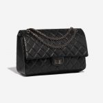 Pre-owned Chanel bag 2.55 Reissue 226 Calf Black Black Side Front | Sell your designer bag on Saclab.com