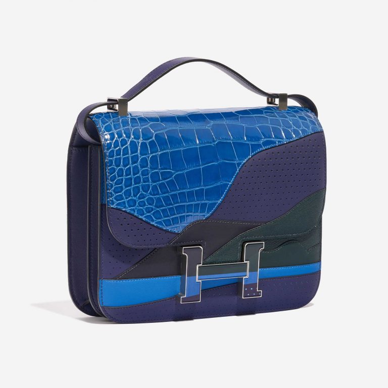 Sac Hermès d'occasion Constance 24 Endless Road Swift / Alligator / lézard Blue Encre / Blue Zellige / Vert Cypress / Blue Nuit Blue, Multicolore Side Front | Vendez votre sac de créateur sur Saclab.com