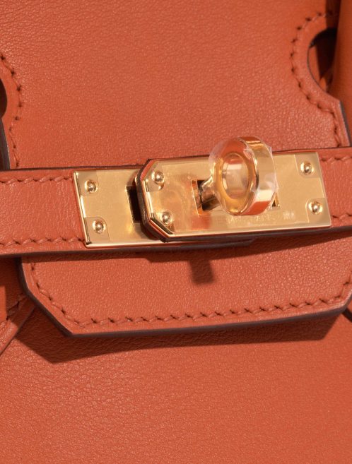 Pre-owned Hermès bag Birkin 25 Swift Terre Battue Brown, Orange, Red Closing System | Sell your designer bag on Saclab.com