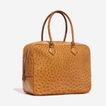 Pre-owned Hermès bag Plume Ostrich Cognac Brown Side Front | Sell your designer bag on Saclab.com