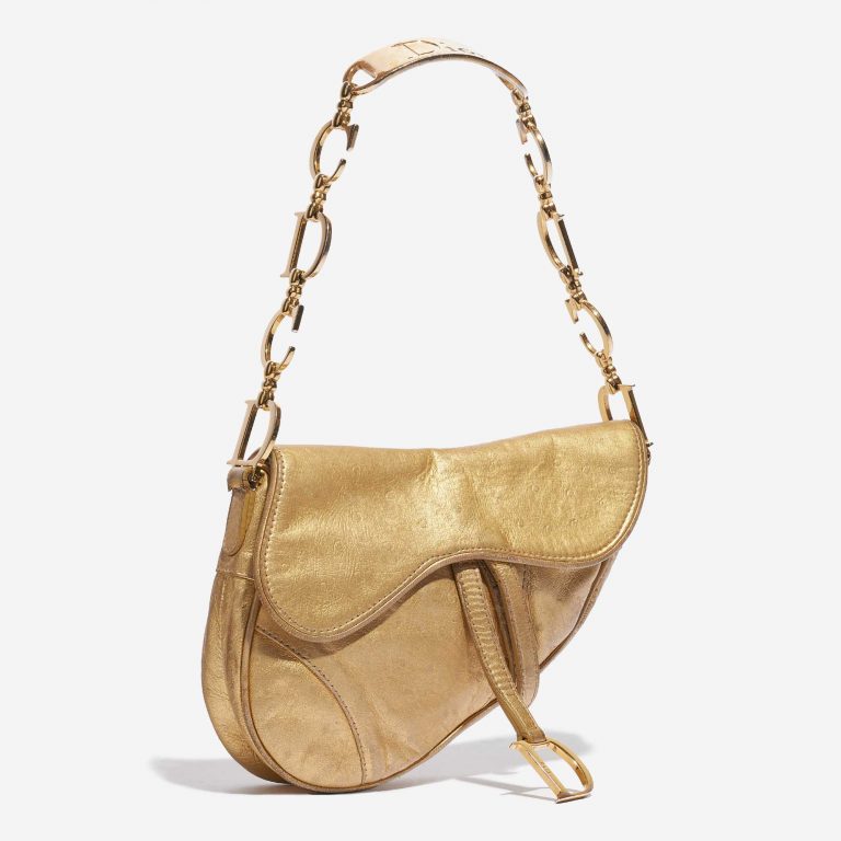 Pre-owned Dior bag Saddle Mini Ostrich Gold Gold Side Front | Sell your designer bag on Saclab.com