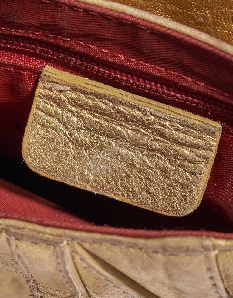 Pre-owned Dior bag Saddle Mini Ostrich Gold Gold Logo | Sell your designer bag on Saclab.com