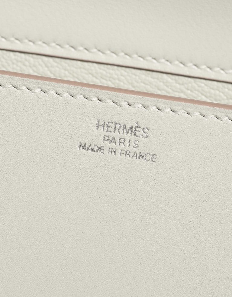 Pre-owned Hermès bag Medor Clutch Swift Gris Perle White Logo | Sell your designer bag on Saclab.com