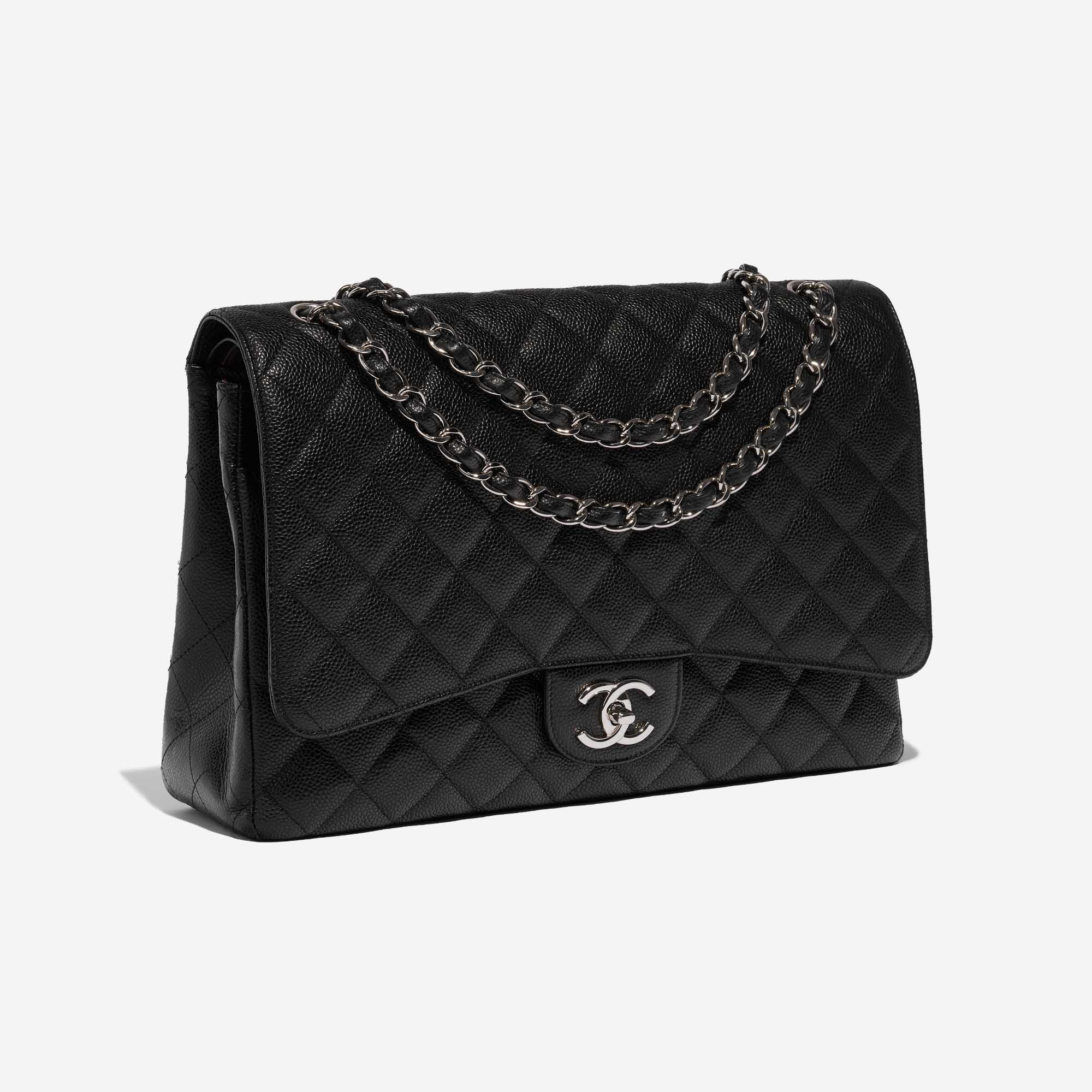 Pre-owned Chanel bag Timeless Maxi Caviar Black Black Side Front | Sell your designer bag on Saclab.com