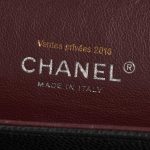 Pre-owned Chanel bag Timeless Maxi Caviar Black Black Logo | Sell your designer bag on Saclab.com