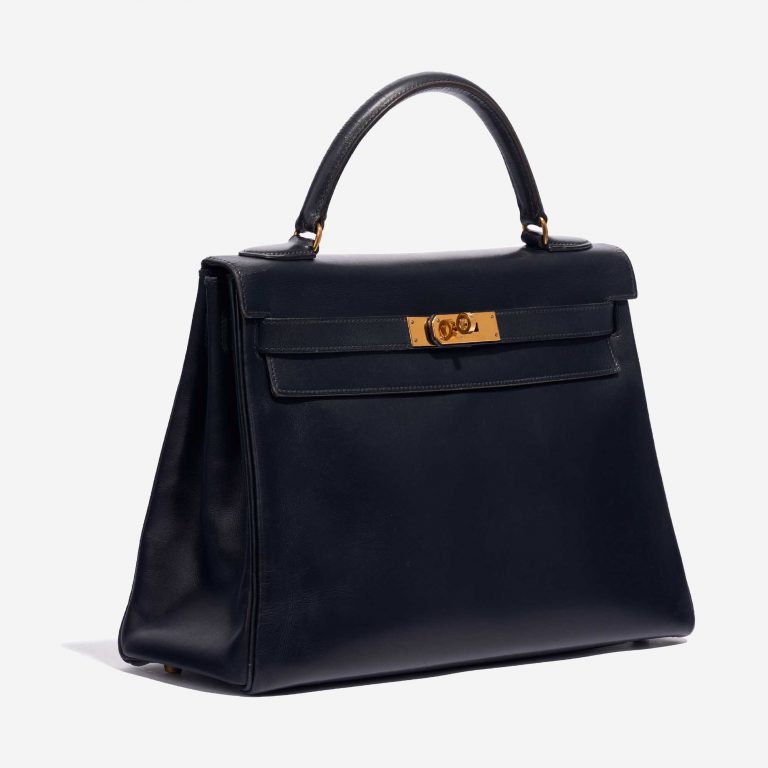 Sac d'occasion Hermès Kelly 32 Box Bleu Marine Side Front | Vendez votre sac de créateur sur Saclab.com