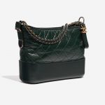 Pre-owned Chanel bag Gabrielle Large Aged Calf Green Black Side Front | Sell your designer bag on Saclab.com
