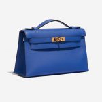 Pre-owned Hermès bag Kelly Pochette Swift Blue de France Blue Side Front | Sell your designer bag on Saclab.com