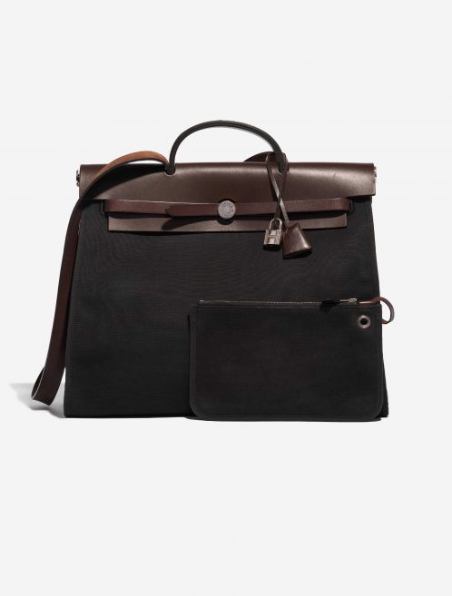 Pre-owned Hermès bag Herbag 39 Toile / Vache Hunter Black / Chocolate Black, Brown Front | Sell your designer bag on Saclab.com